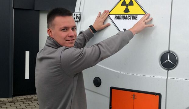 Driver attaches radioactive class 7 sticker to the rear, hazardous goods